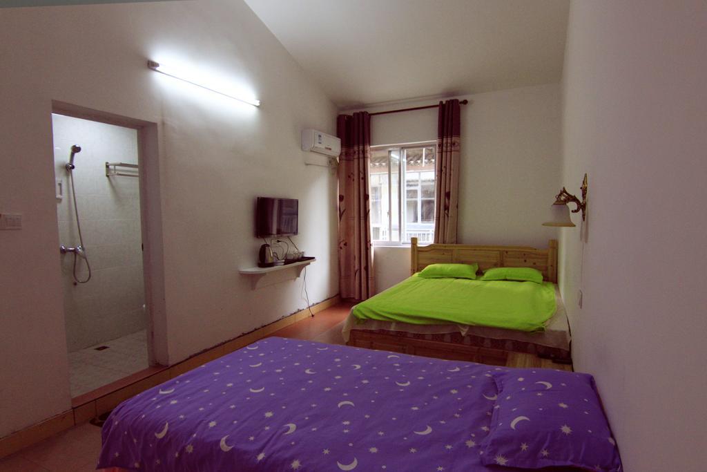 Lan Shan Chu Youth Hostel Yangshuo Zimmer foto
