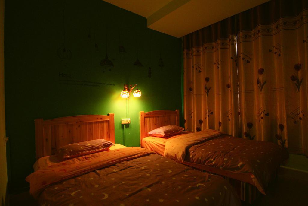 Lan Shan Chu Youth Hostel Yangshuo Zimmer foto