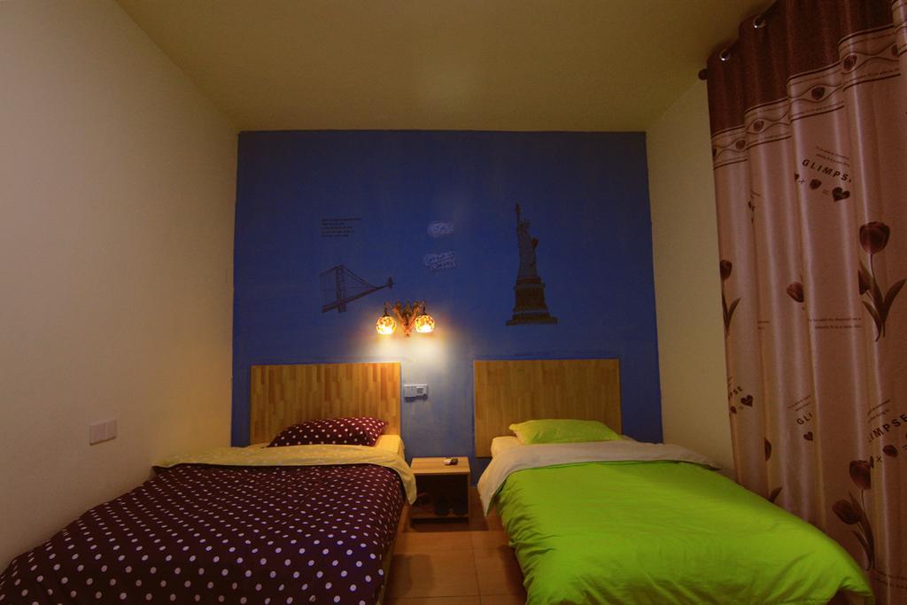 Lan Shan Chu Youth Hostel Yangshuo Zimmer foto