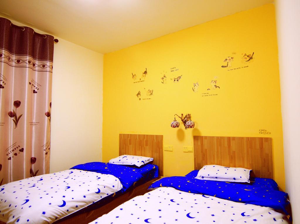 Lan Shan Chu Youth Hostel Yangshuo Zimmer foto